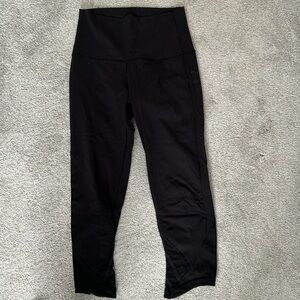 Lululemon Black Cropped legging with lower mesh side detail Size 6